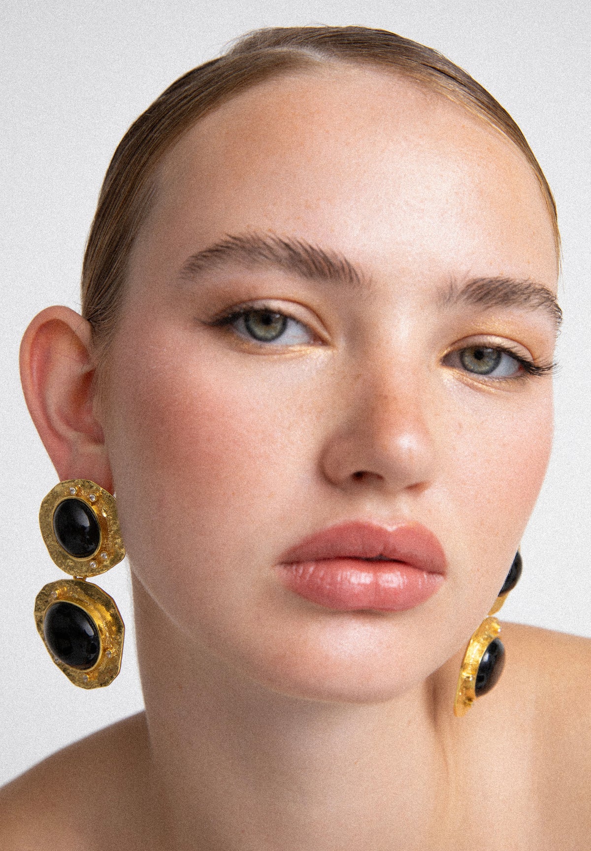 PENDIENTES NEGRO DORADOS